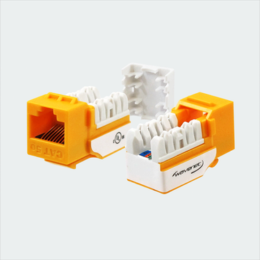 Manufacturer yellow CAT5E SDJ jack shown in multiple views with cap removed. This listing supplies 25 yellow jacks and 25 wire caps.