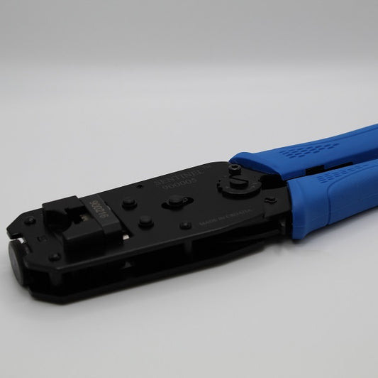 Sentinel 900005 ratchet crimp tool with installed 900216 die and blue handles, angled manufacturer view.