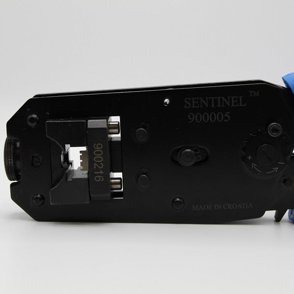 Sentinel 900005 tool head showing the 900005 model and installed 900216 die markings.