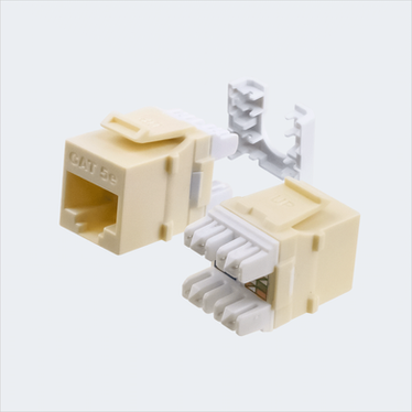Manufacturer light almond CAT5E HDJ jack shown in multiple views with cap removed. This listing supplies one light almond jack and one wire cap.