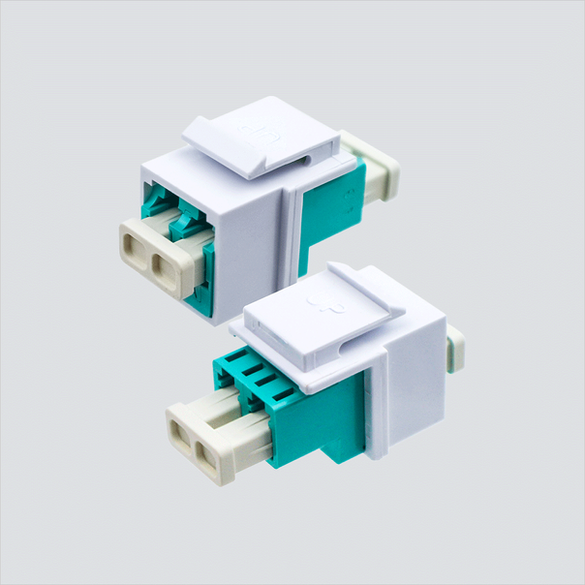 Two views of Wavenet FOKSALCWH aqua duplex LC adapter in a white keystone housing