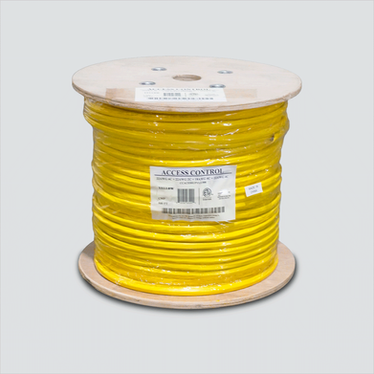 Yellow composite access-control cable on a wooden reel